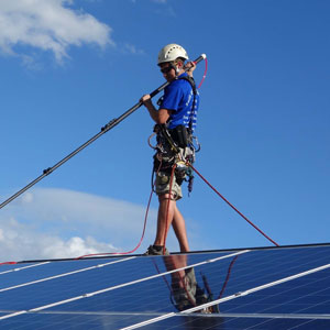 Solar panel cleaning safely in harness